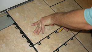 Installing basement floor tiles in a renovated basement